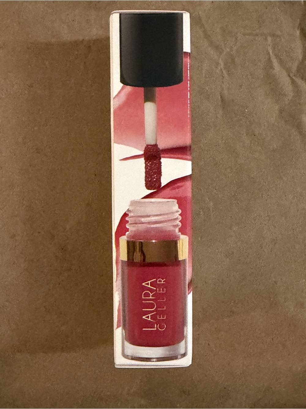 Laura Geller Treat-N-Go Tinted Lip Oil in shade Runner Up #lipstick #tinted